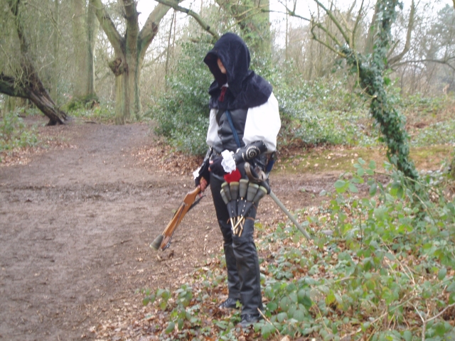 Kit Fisable, lurking with a crossbow.