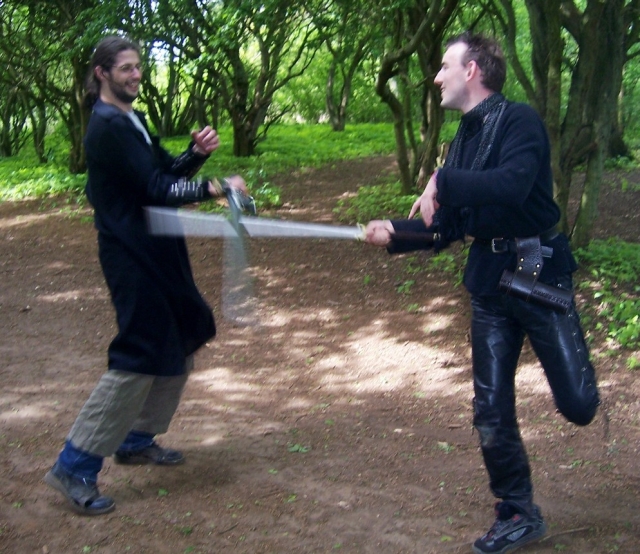Now can anyone tell me what Fergus is doing wrong? That's right, boys and girls, he's using a weak parry. And what is Dom doing wrong? Very good, he's dancing around like a fairy.